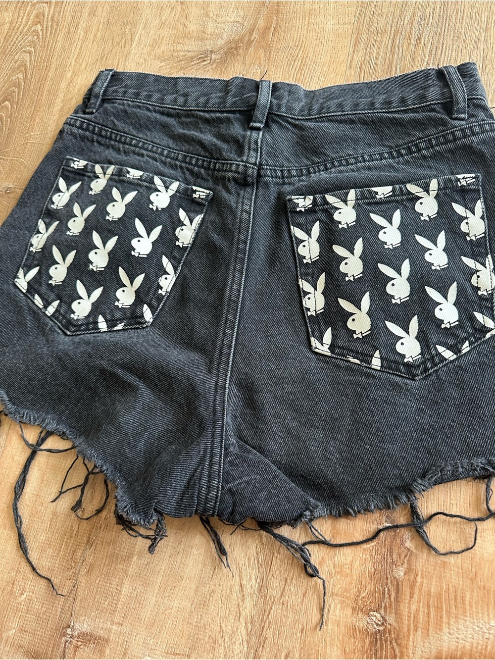 PLAYBOY Black Denim High-Rise Cutoff Shorts with Bunny Pocket Print
